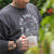 Man wearing Unisex Canadian coffee roaster crewneck Road Coffee Made for Days Like This